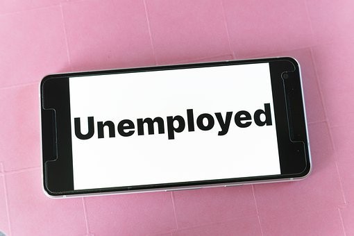 Shows mobile device showing the word "Unemployed" in black letters against a white background.