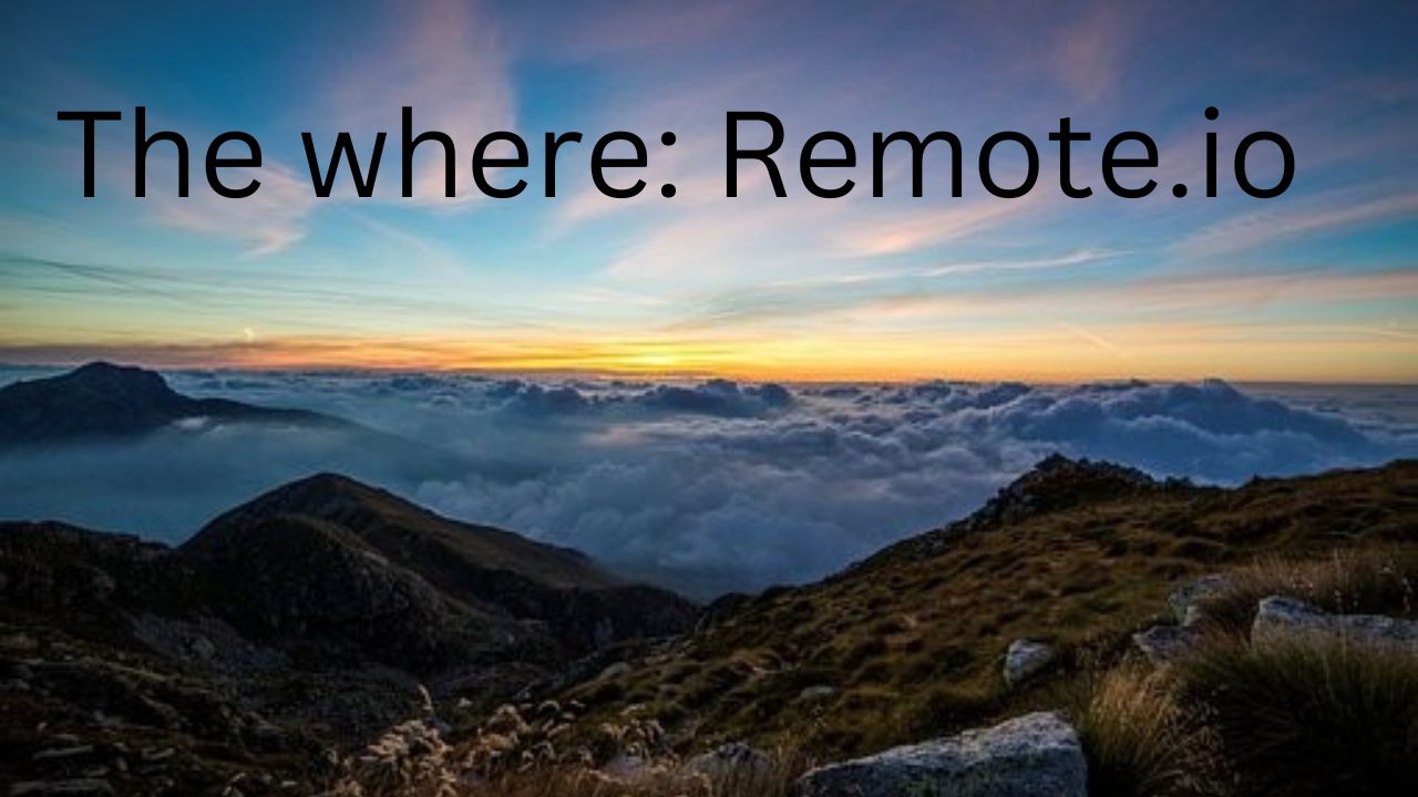 Have a picture of mountains with clouds with a line written on top of the picture that says The Where Remote.io